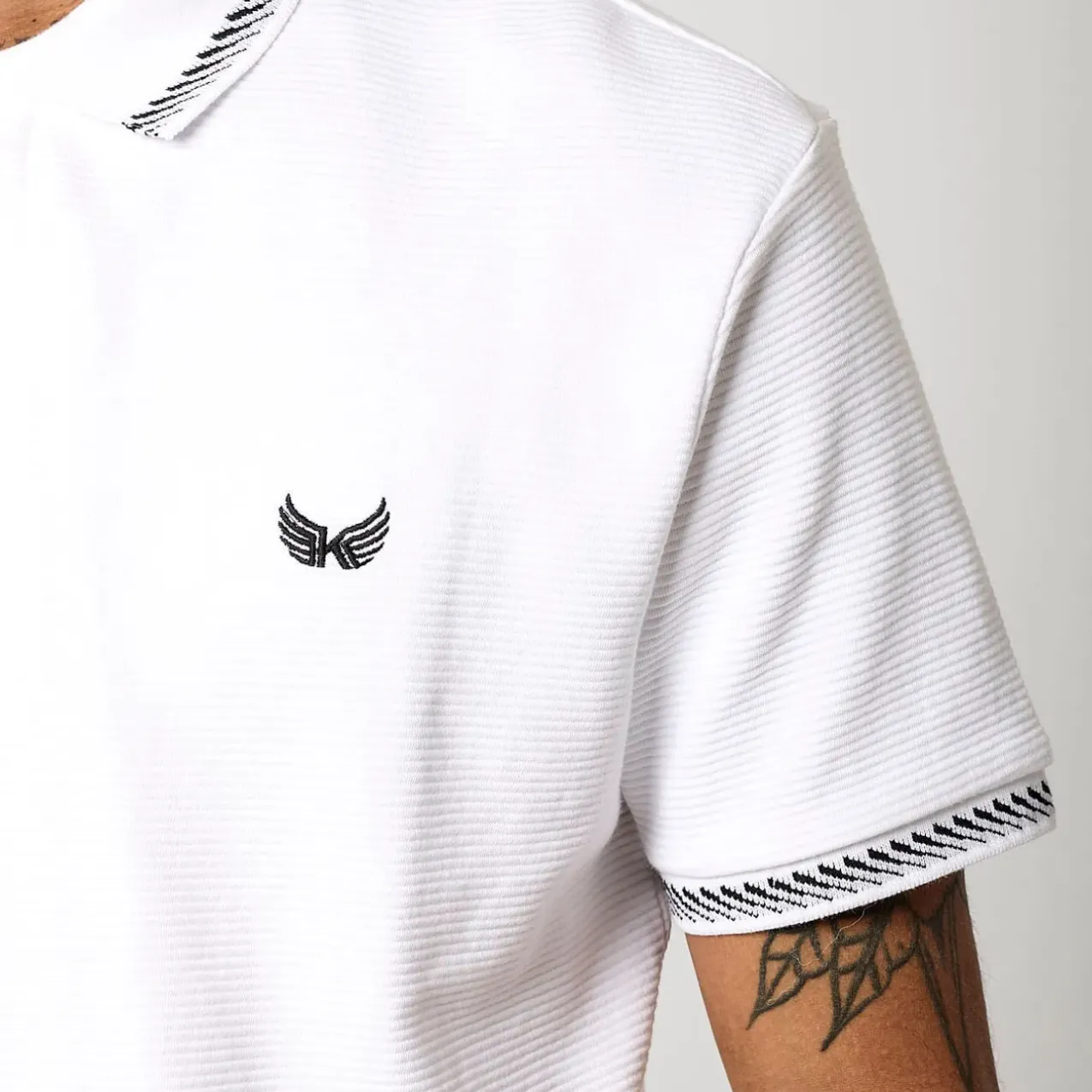 Kaporal Polos<TIRU